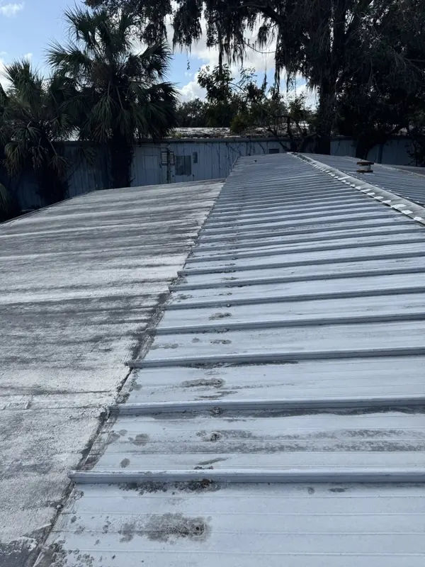 Faded and chalky metal roof before painting on a mobile home