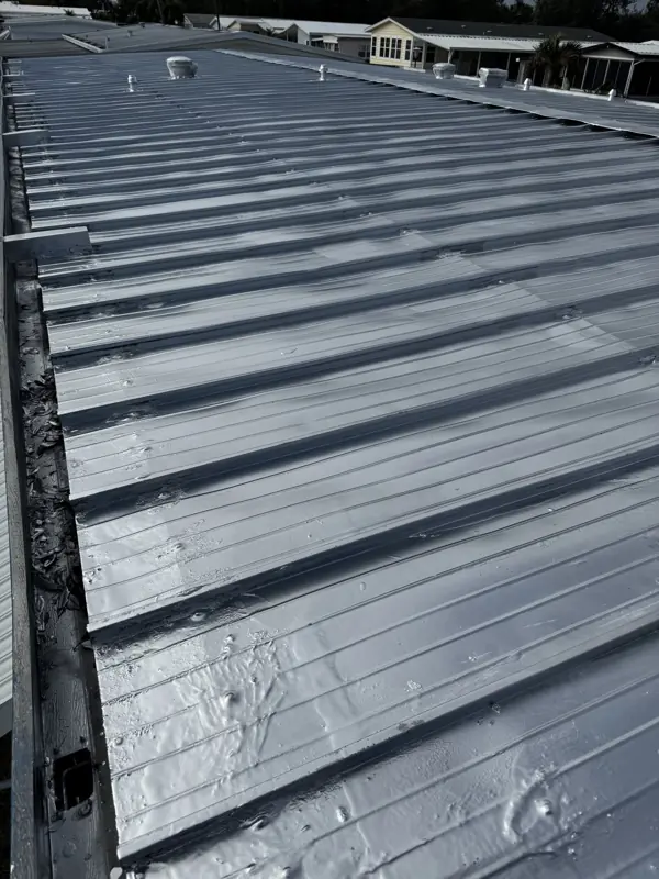 Close-up of freshly painted metal roof panels