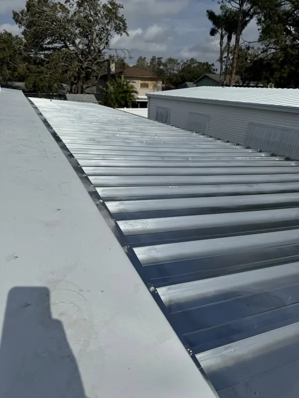 Mobile home metal roof painted silver, ridge view