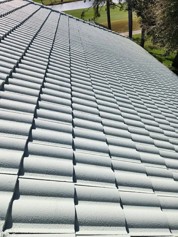 Close-up of freshly painted sage green tile roof in Sarasota, FL