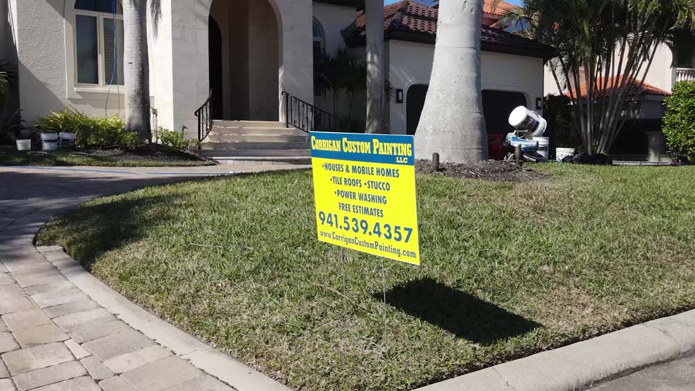 Corrigan Custom Painting sign stuck in a lawn